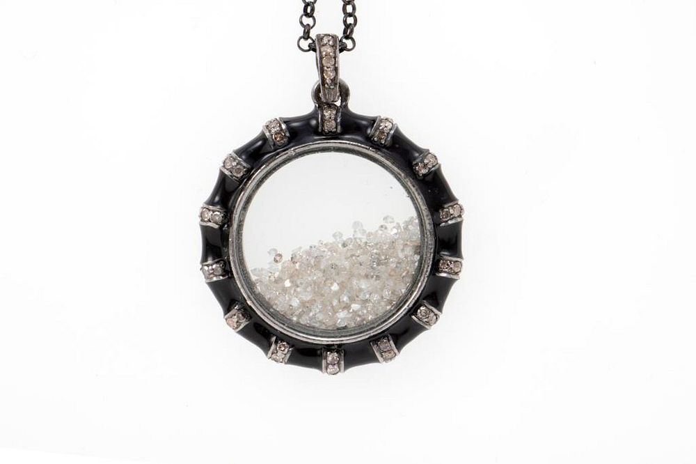 Appraisal: Diamond enamel silver shaker pendant with chain estimated total diamond