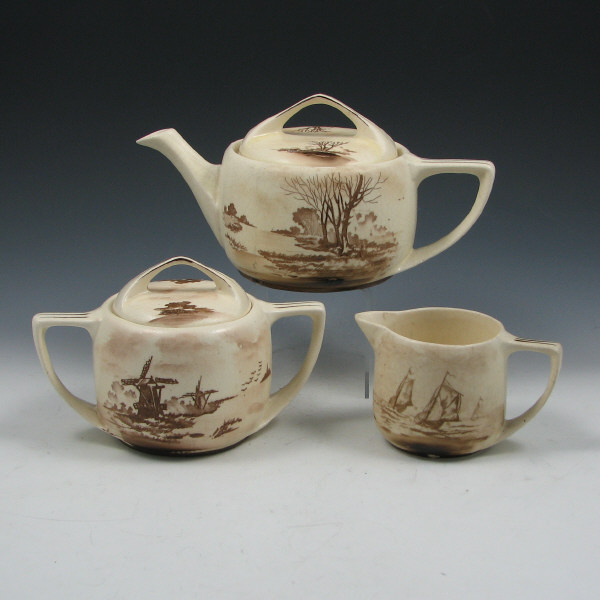 Appraisal: Roseville Decorated Creamware Landscape tea set with scenes of ships