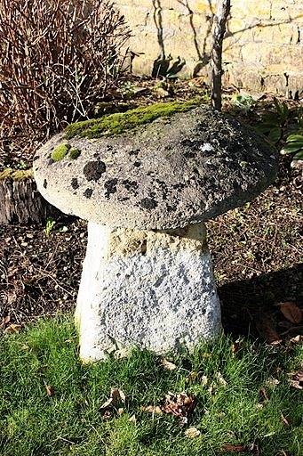 Appraisal: A staddle stone with irregular circular top and a tapered