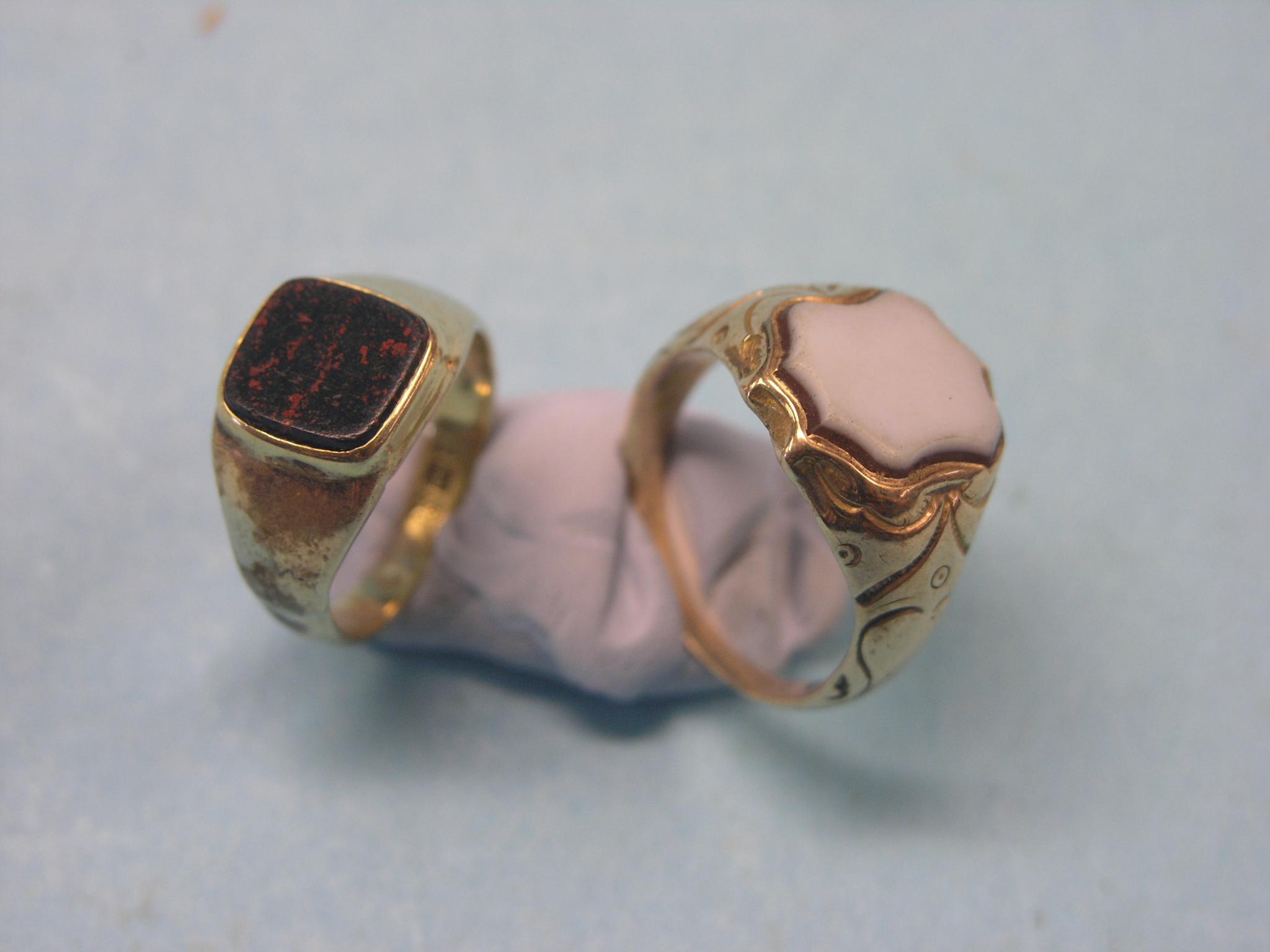 Appraisal: Two ct gold signet rings each with inset hardstone one