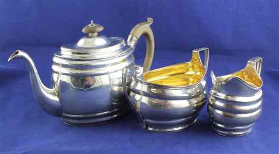 Appraisal: A George III silver composite three piece tea set of