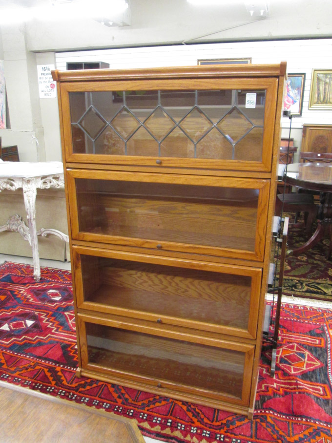 Appraisal: A 'STACKING' OAK BOOKCASE American late th century featuring four