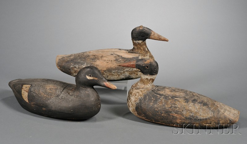 Appraisal: Three Carved and Painted Duck Decoys America early th century