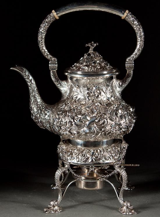 Appraisal: American repousse sterling silver hot water kettle on stand Stieff