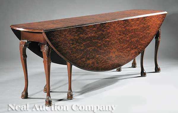 Appraisal: An Antique Georgian-Style Yewwood Drop-Leaf Dining Table th c the