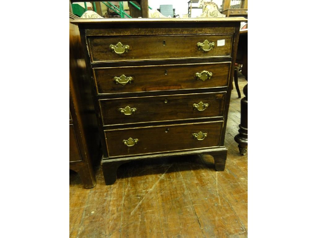 Appraisal: A small th century mahogany chest fitted with an arrangement