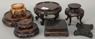 Appraisal: Group of eight Chinese hardwood stands Group of eight Chinese