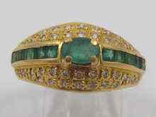 Appraisal: A yellow metal tests ct gold emerald and diamond ring