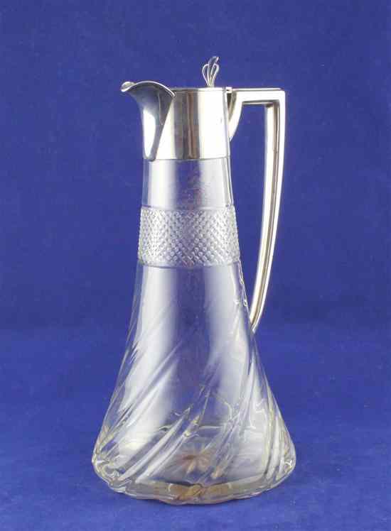 Appraisal: An Edwardian silver mounted cut glass claret jug of conical