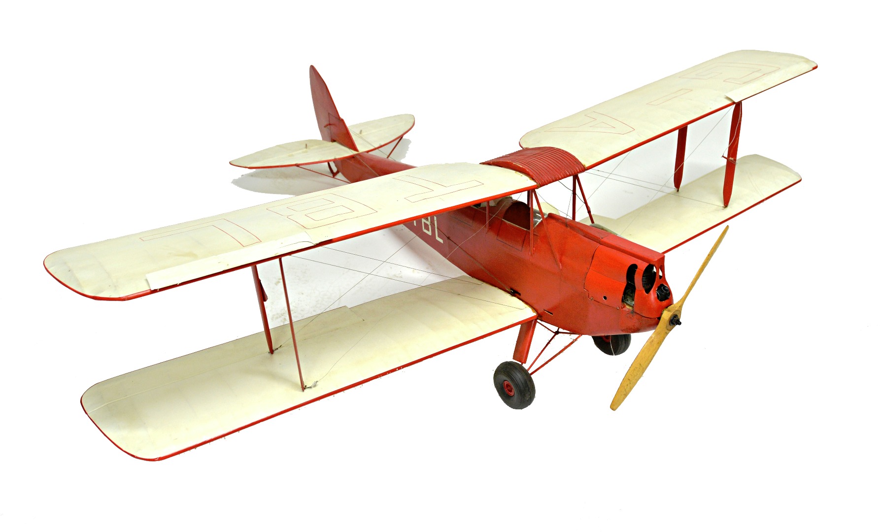 Appraisal: A model biplane possibly a Gypsy Moth coloured white against