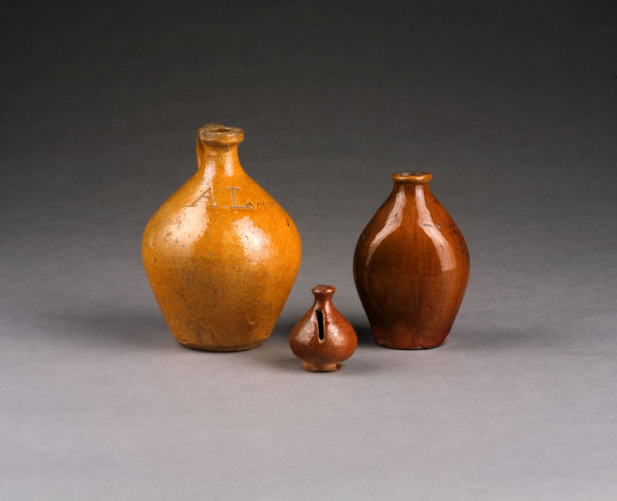 Appraisal: SMALL AMERICAN REDWARE JUG INCISED quot A LOOMIS quot Together