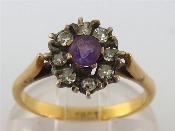 Appraisal: An carat gold diamond and amethyst cluster ring the central