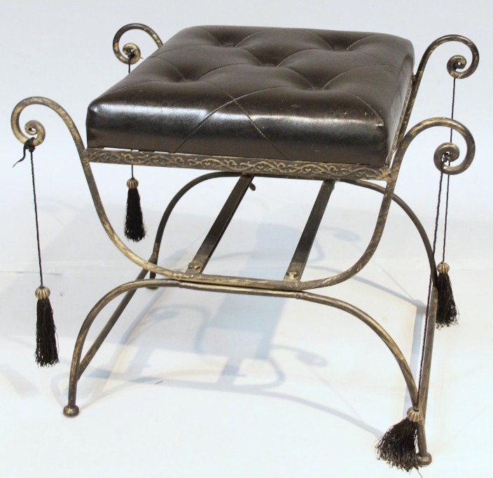 Appraisal: A modern metal framed Glastonbury stool with an overstuffed button