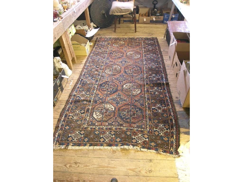 Appraisal: An early th century Persian wool rug geometric designs in