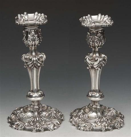 Appraisal: A PAIR OF GEORGE III SILVER CANDLESTICKS with pressed scroll