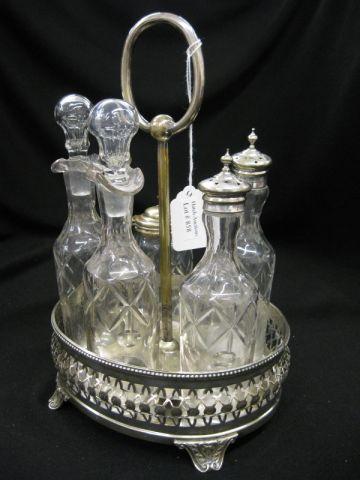 Appraisal: Silverplate Castor Set five cut crystal bottles center handle