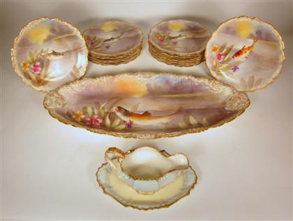 Appraisal: Limoges gilt and painted porcelain partial fish service late th