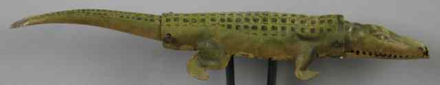 Appraisal: ALLIGATOR HAND TOY C D KENNY CO AD Lithographed tin