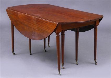 Appraisal: DIRECTOIRE MAHOGANY EXTENSION DROP-LEAF DINING TABLE The divided top with