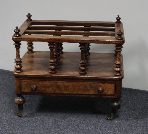 Appraisal: A Victorian figured walnut three-division music Canterbury with turned uprights