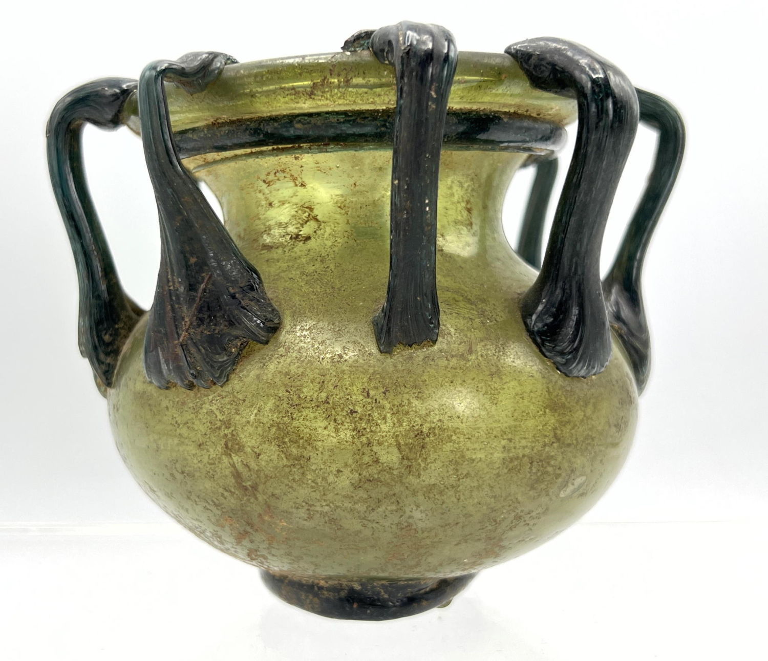 Appraisal: Dark green Squat vessel with applied loop handles Ancient Roman