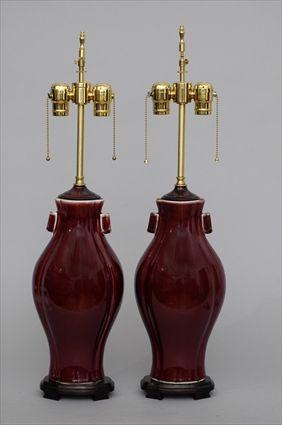 Appraisal: PAIR OF CHINESE SANG DE BOEUF-GLAZED PORCELAIN TABLE LAMPS Of