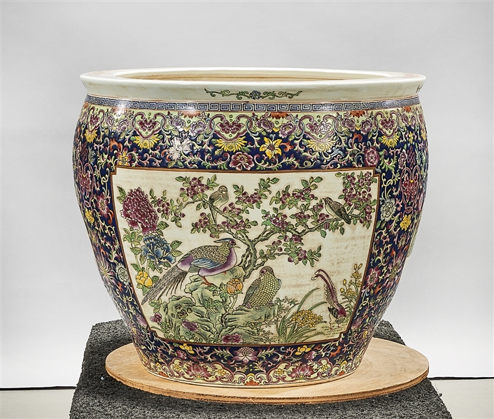 Appraisal: Chinese enameled porcelain fish bowl with scenes of flowering trees