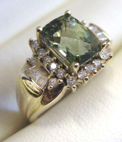 Appraisal: TOURMALINE AND FOURTEEN KARAT GOLD RING with appraisal Prong set