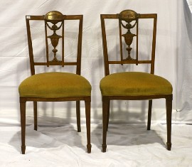 Appraisal: A pair of Edwardian satinwood and inlaid chairs