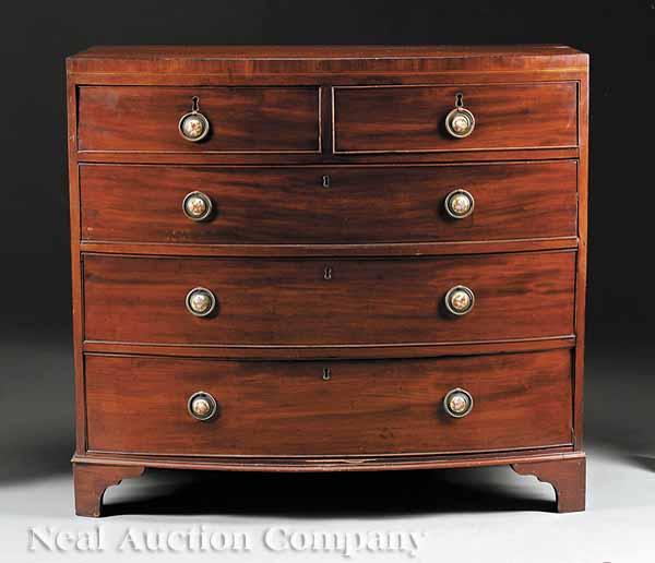 Appraisal: A Georgian Mahogany Bowfront Chest of Drawers with two short