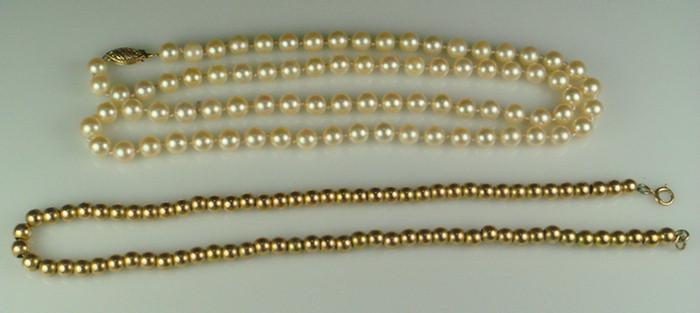 Appraisal: K YG graduated beaded necklace long dwt with a strand