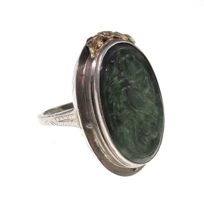 Appraisal: K CARVED JADE RING K white gold ring with x