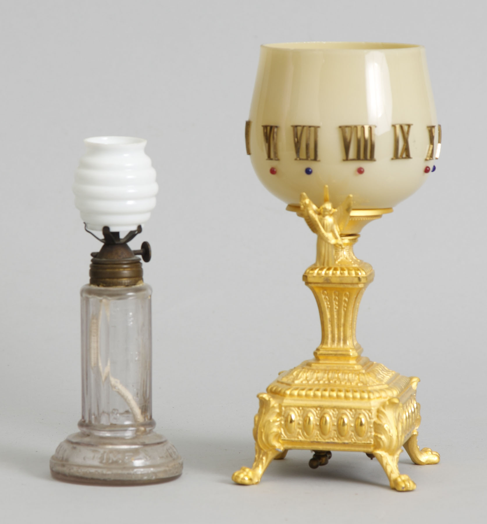 Appraisal: Brass Candle Night Timepiece Brass base with original gilding Glass