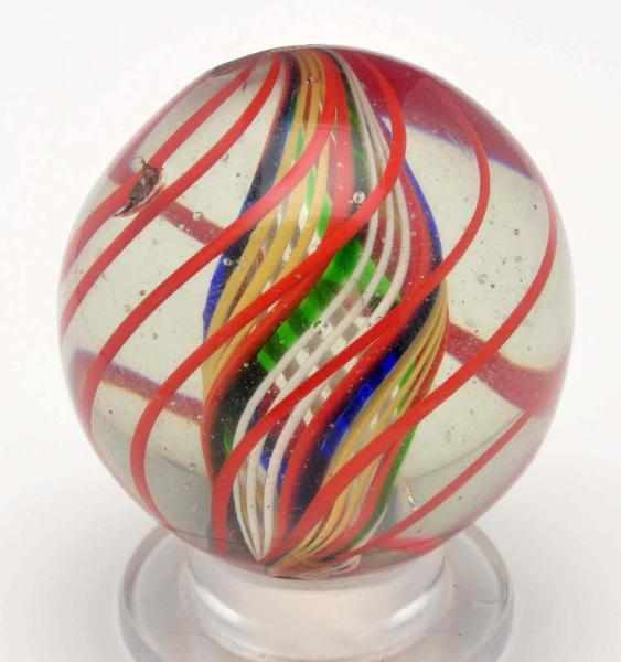 Appraisal: Complex Core Swirl Marble Description Three white latticino threads alternate