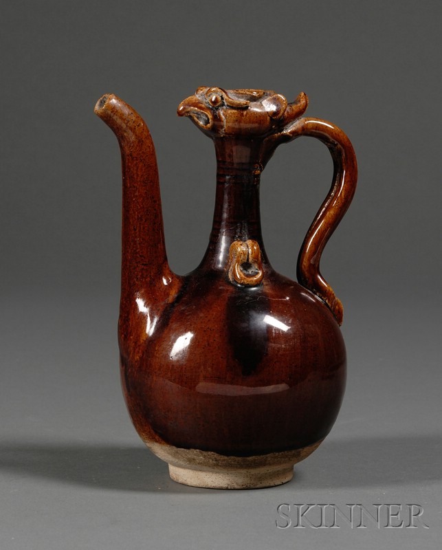 Appraisal: Chicken Head Ewer stoneware with a deep brown glaze ht