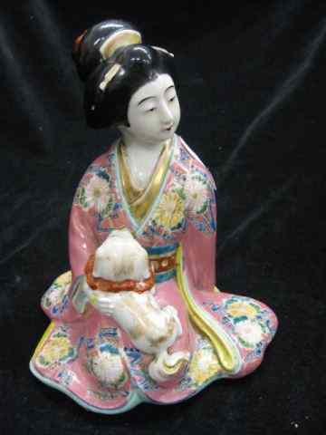 Appraisal: Japanese Porcelain Figurine of a SeatedLady with pup ''