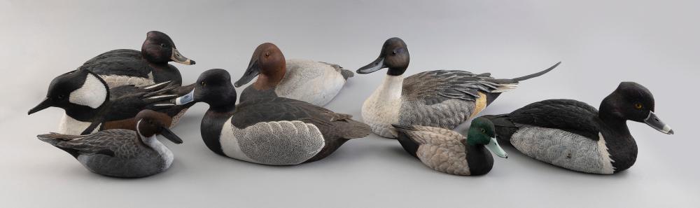 Appraisal: EIGHT DECORATIVE CARVED WOODEN DECOYS LATE TH CENTURY LENGTHS FROM