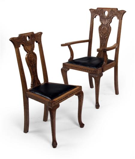 Appraisal: A set of eight Victorian oak carved dining chairs each