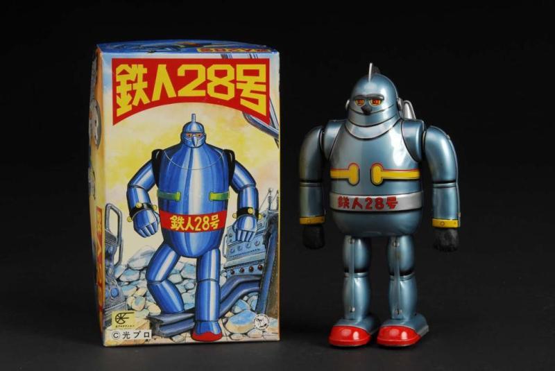 Appraisal: Tin T- Tetsujin Robot Wind-Up Toy Description Japanese Light blue