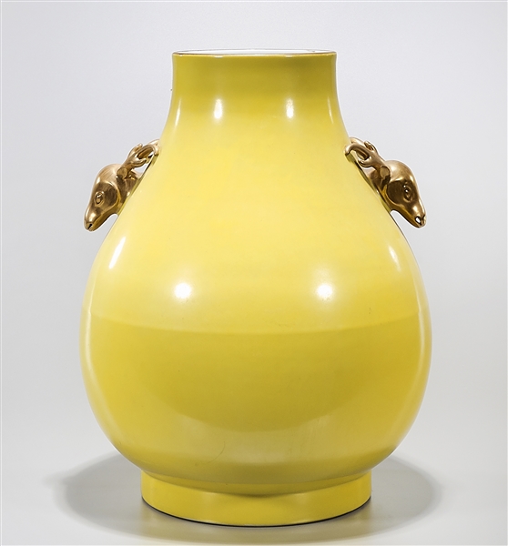 Appraisal: Chinese yellow glazed gilt deer handled vase x approx Condition