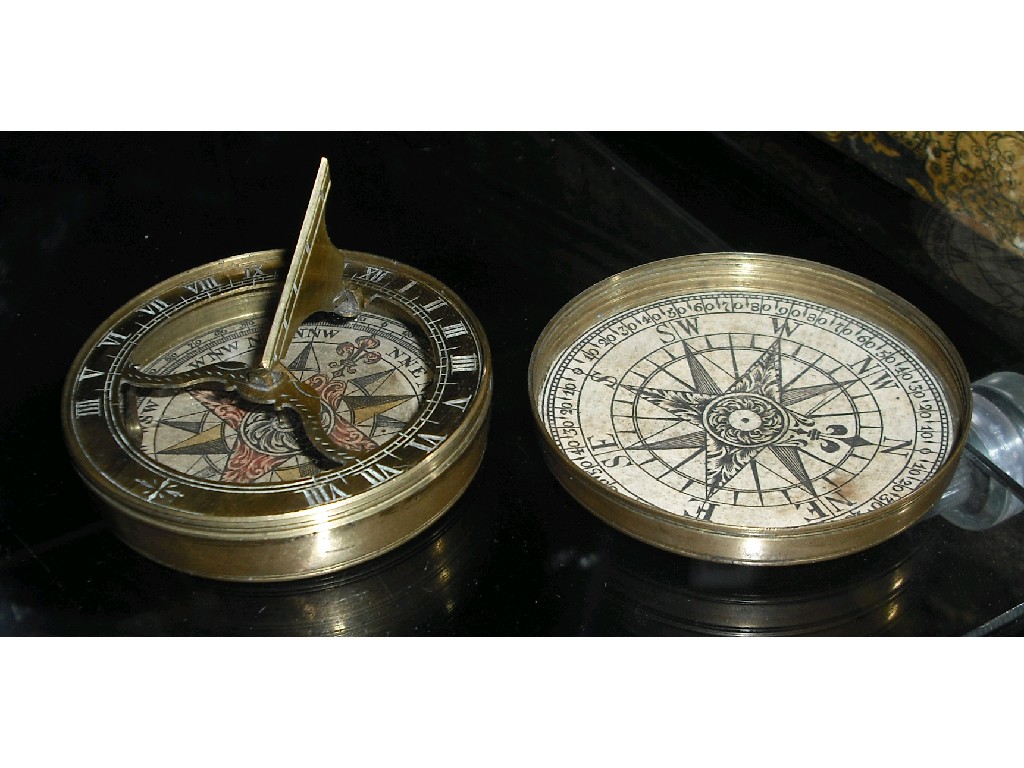 Appraisal: th century brass pocket sundial and compass with glazed compass