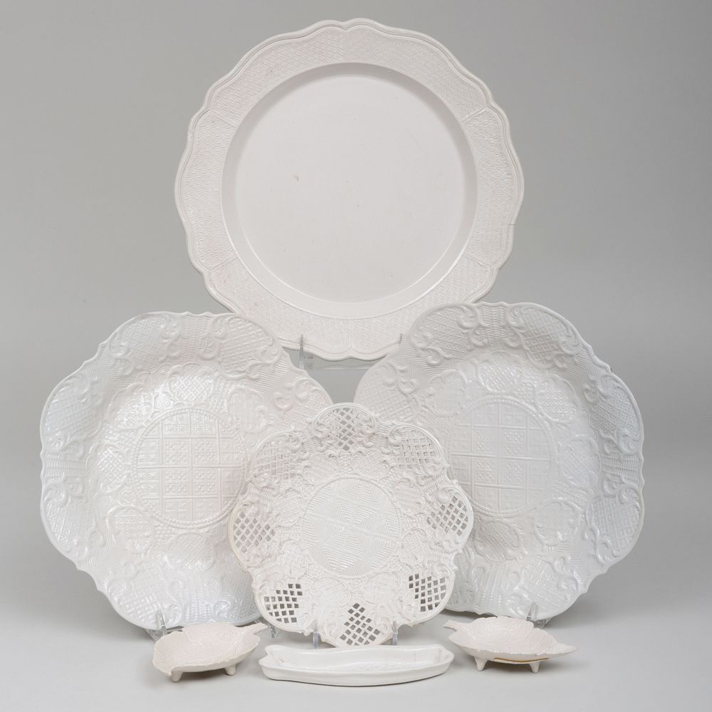 Appraisal: Group of English Salt Glazed Dishes Comprising A shaped charger