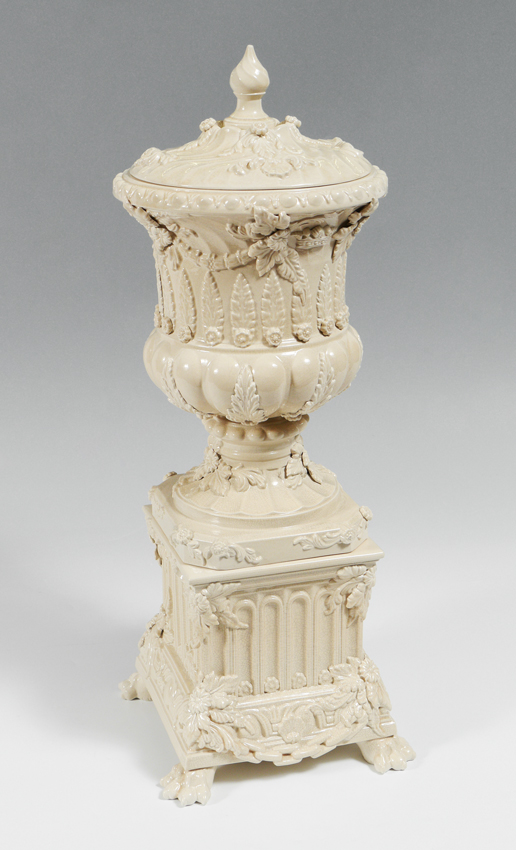 Appraisal: STAFFORDSHIRE PETER WELDON CREAMWARE URN ON STAND Adamesque style covered