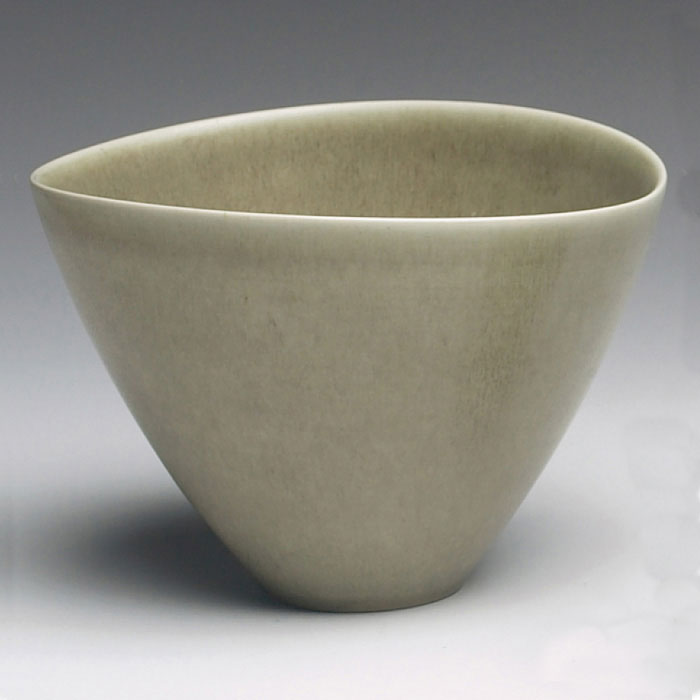 Appraisal: PalShus bowl oval form covered in a green matte glaze