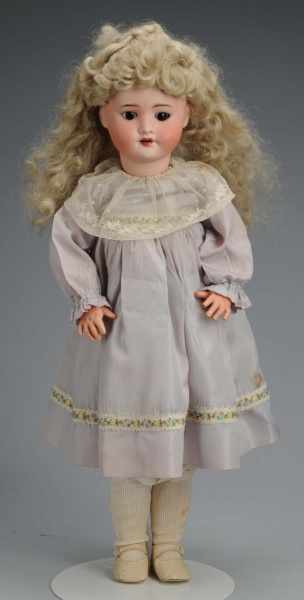 Appraisal: SFBJ French Bisque Child Doll Description Mold cheek rub brown