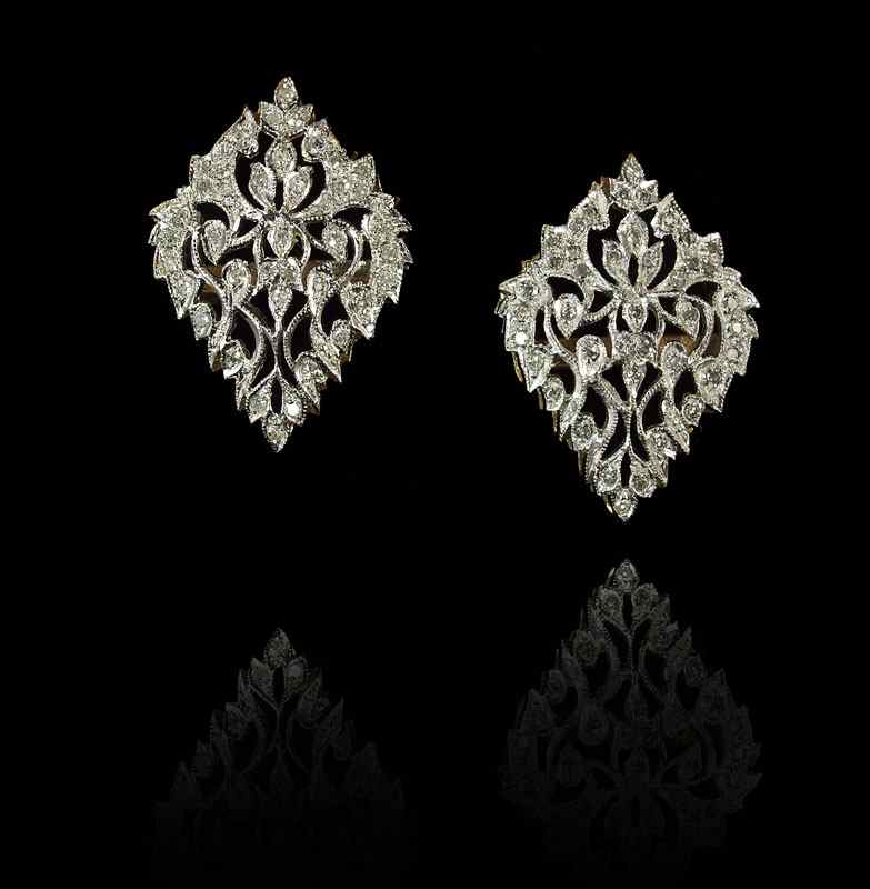 Appraisal: K DIAMOND EARRINGS K yellow gold earrings contains round single