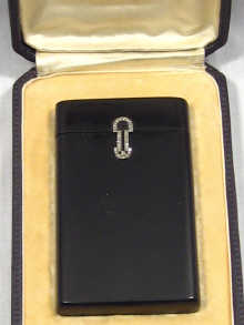 Appraisal: Boucheron An ebonised wooden card case mounted with diamonds and