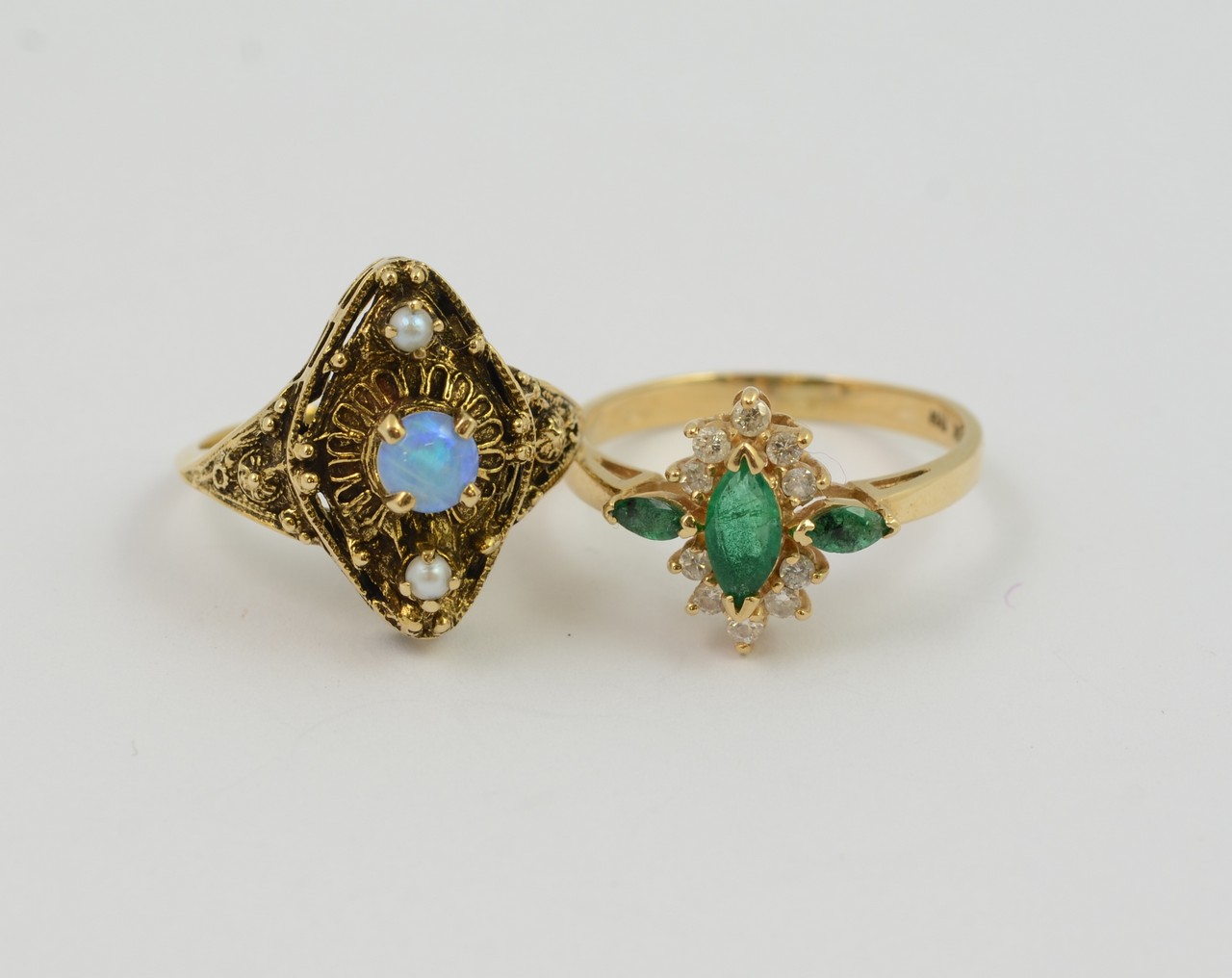 Appraisal: K yellow gold rings one with opal pearls the other