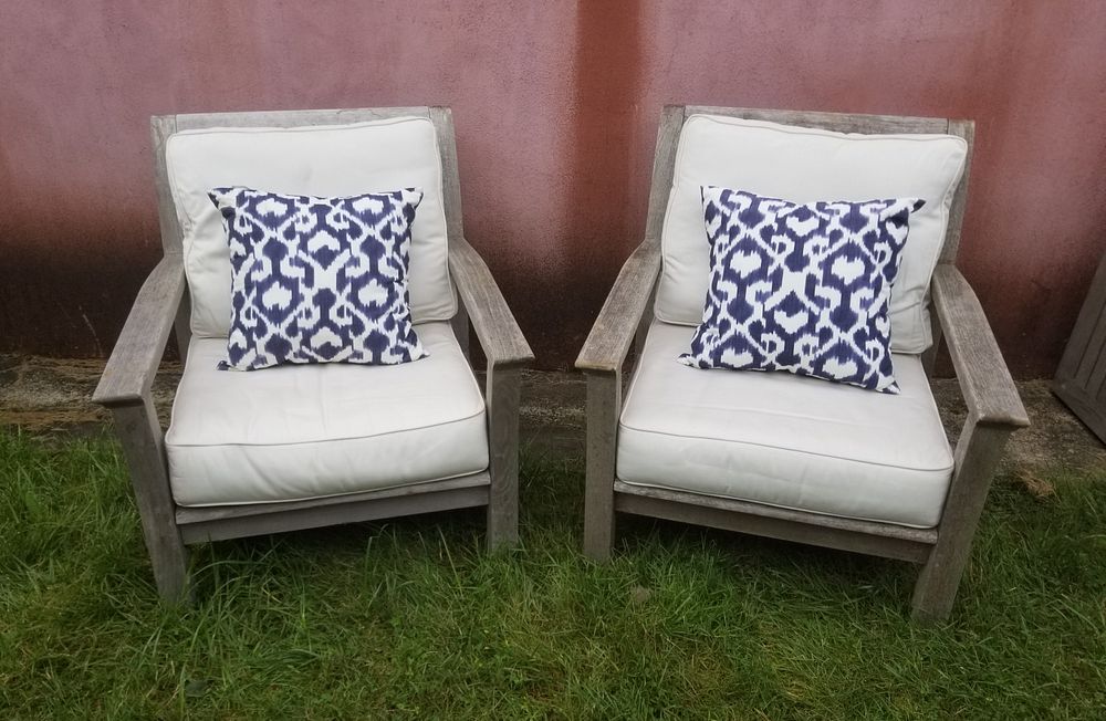 Appraisal: Pair of Kingsley Bates Teak Wood Armchairs with White Cushions