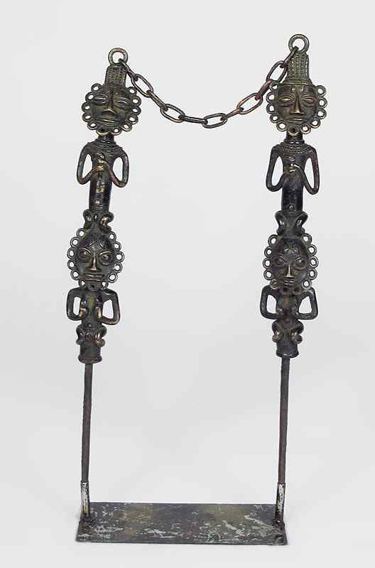 Appraisal: TWO BRONZE FIGURAL SPEAR TOTEMS SCULPTURE Each connected to other